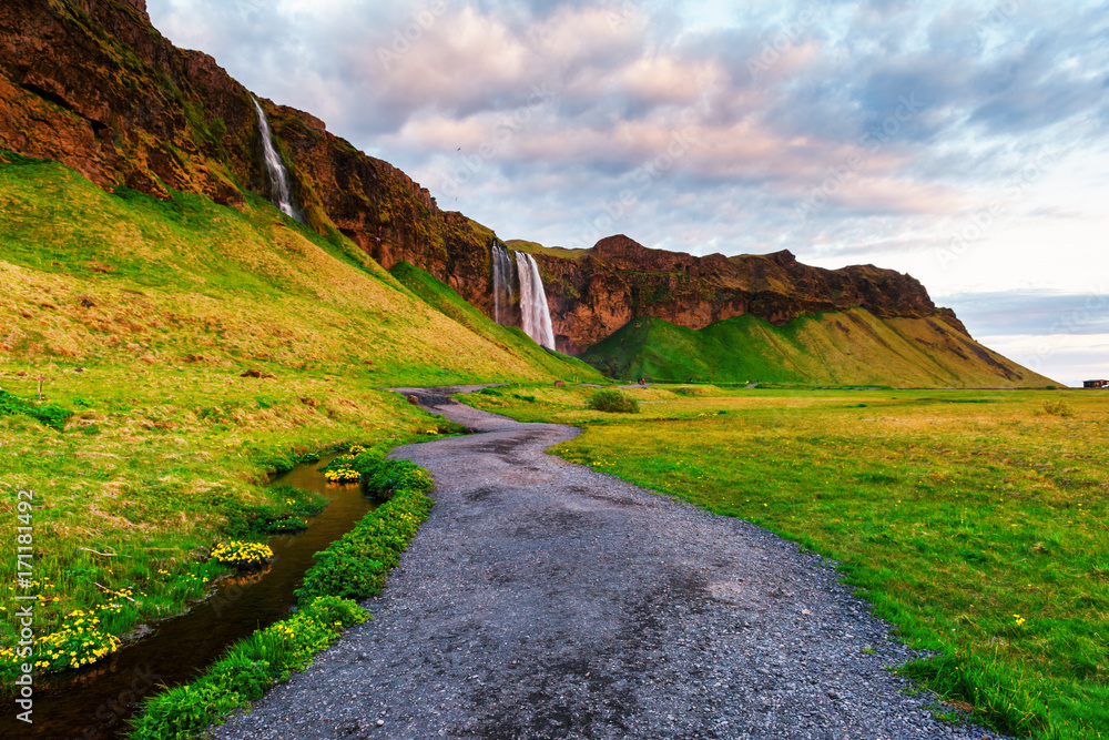 Sunrise on Seljalandfoss waterfall