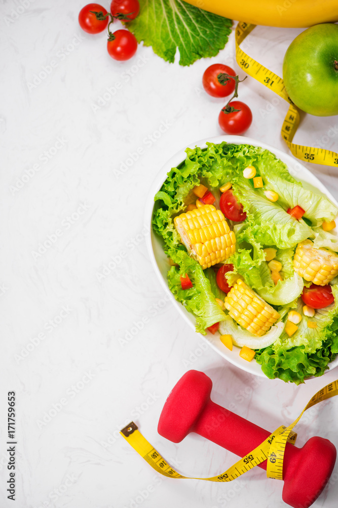 Healthy fitness meal with fresh salad. Diet concept.