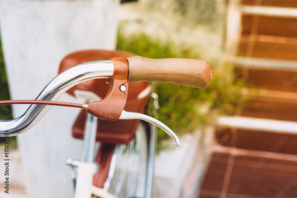 closeup handle/brake of a vintage bicycle.