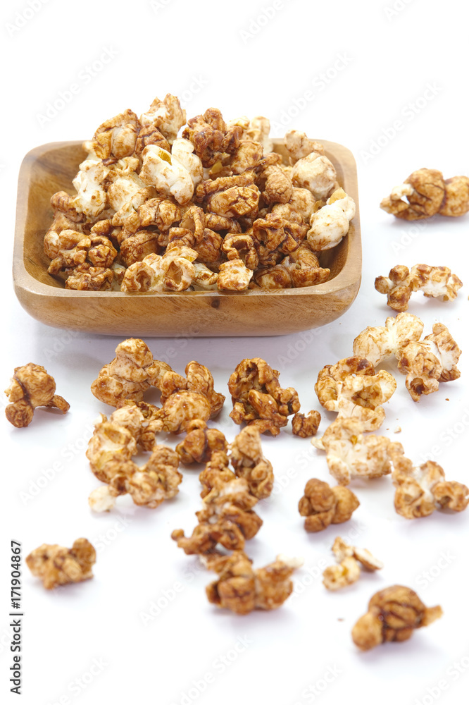 Close - up Caramel chocolate popcorn on white background