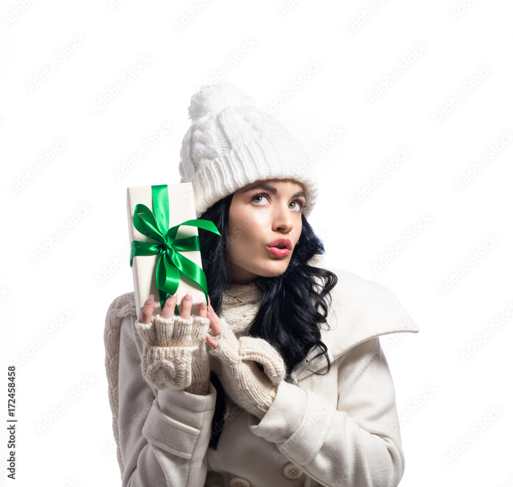 Young woman holding a Christmas gift box