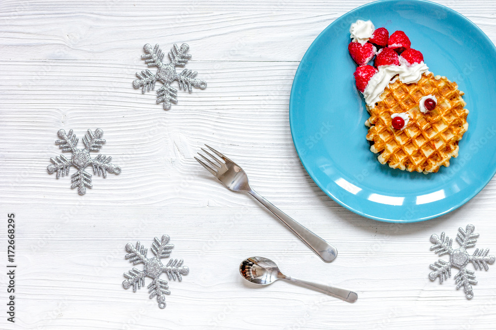 breakfast for child on Christmas with waffle top view