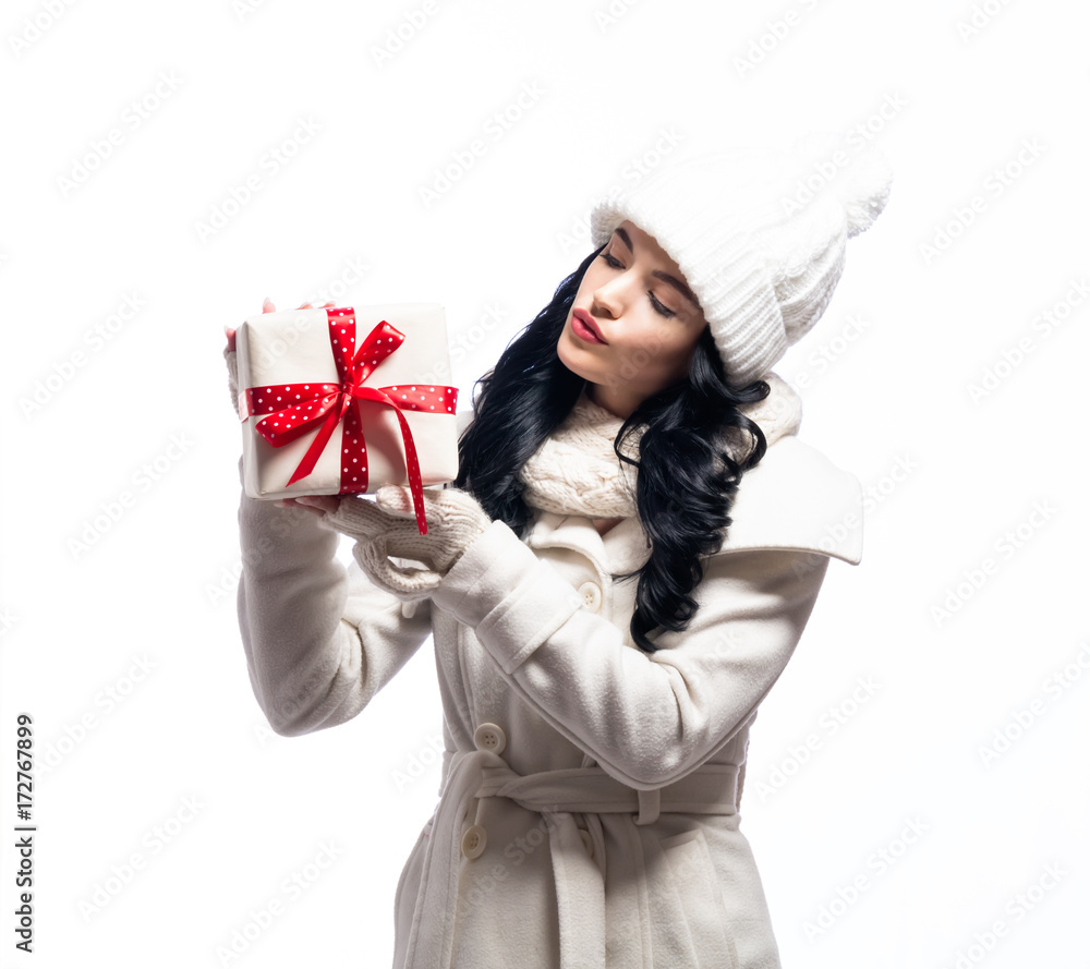 Young woman holding a Christmas gift box