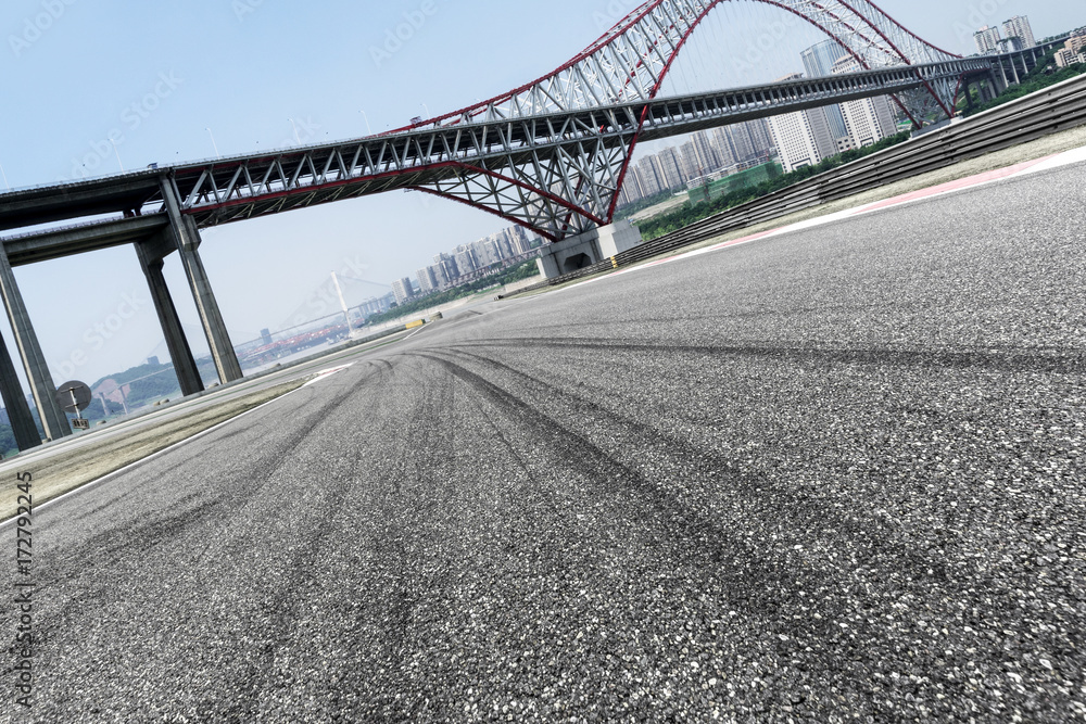 empty asphalt road with cityscape of modern city