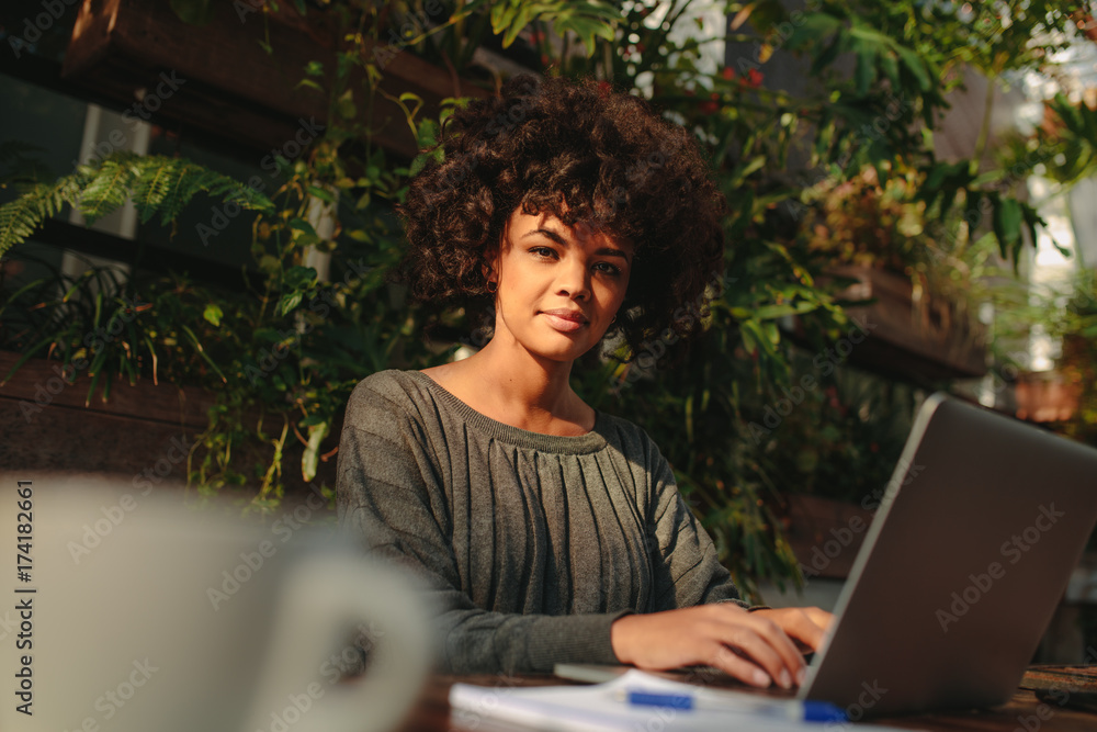 Young woman working on laptop