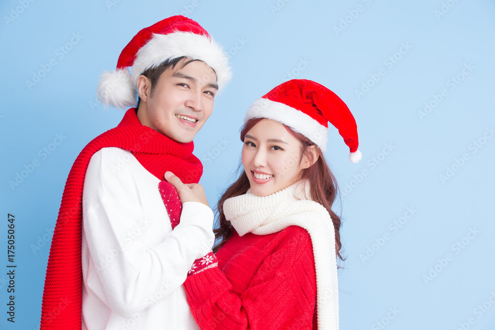 couple smile with merry christmas