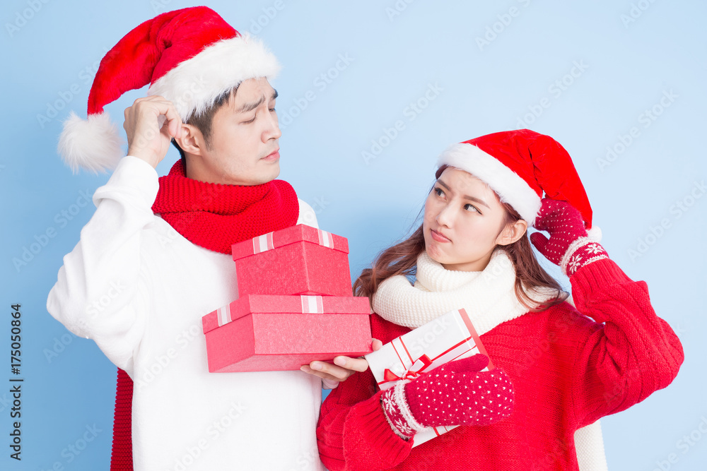 couple smile with merry christmas