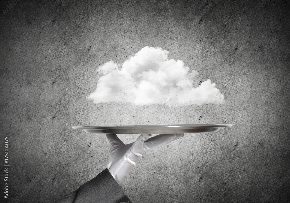 Hand of waitress presenting cloud on tray.