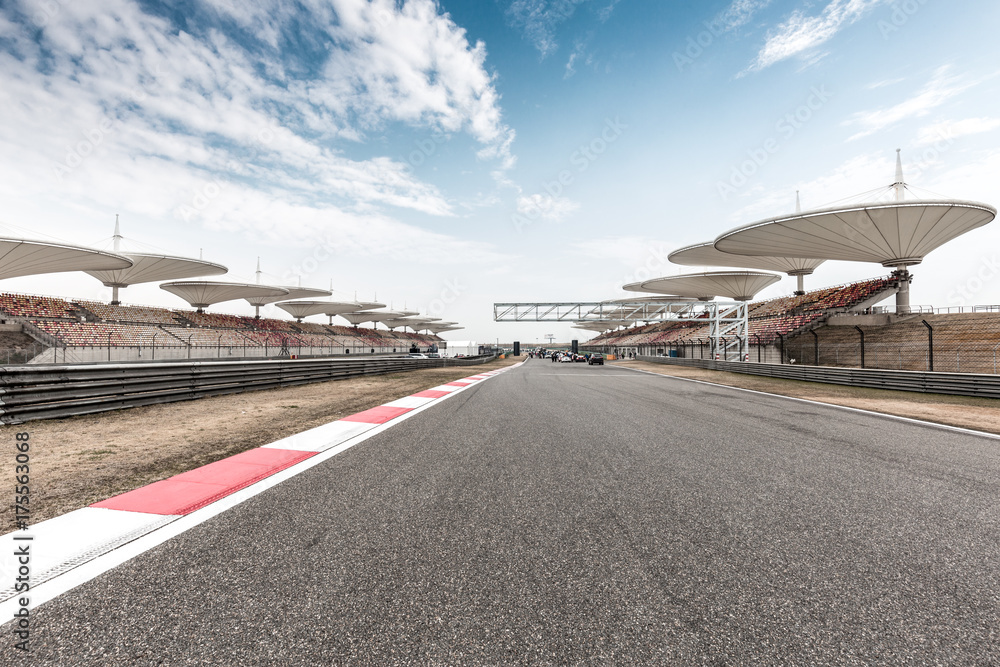 empty asphalt road  in car racing track