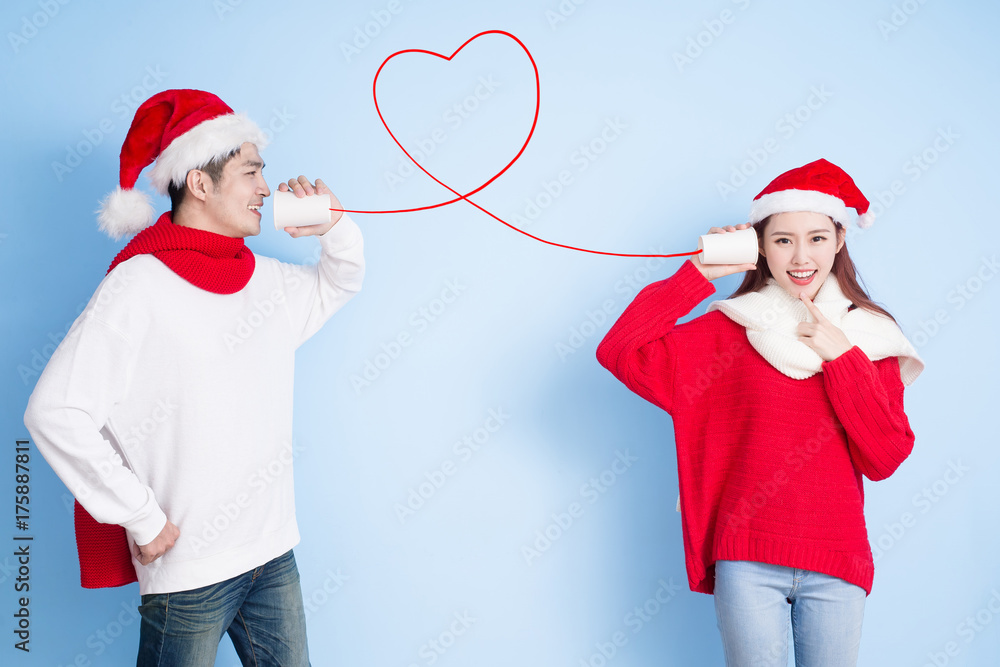 couple smile with merry christmas