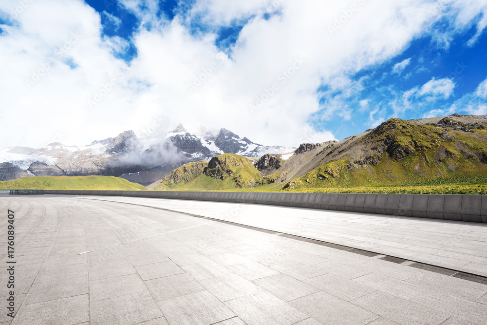 empty marble floor with beautiful snow mountains