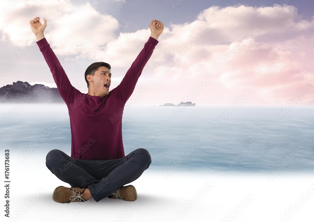 Man yawning by the sea clouds