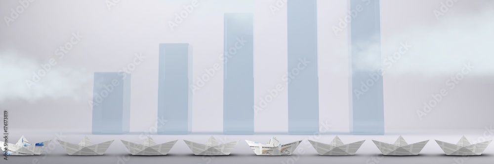 Paper boats in line in room with bar charts