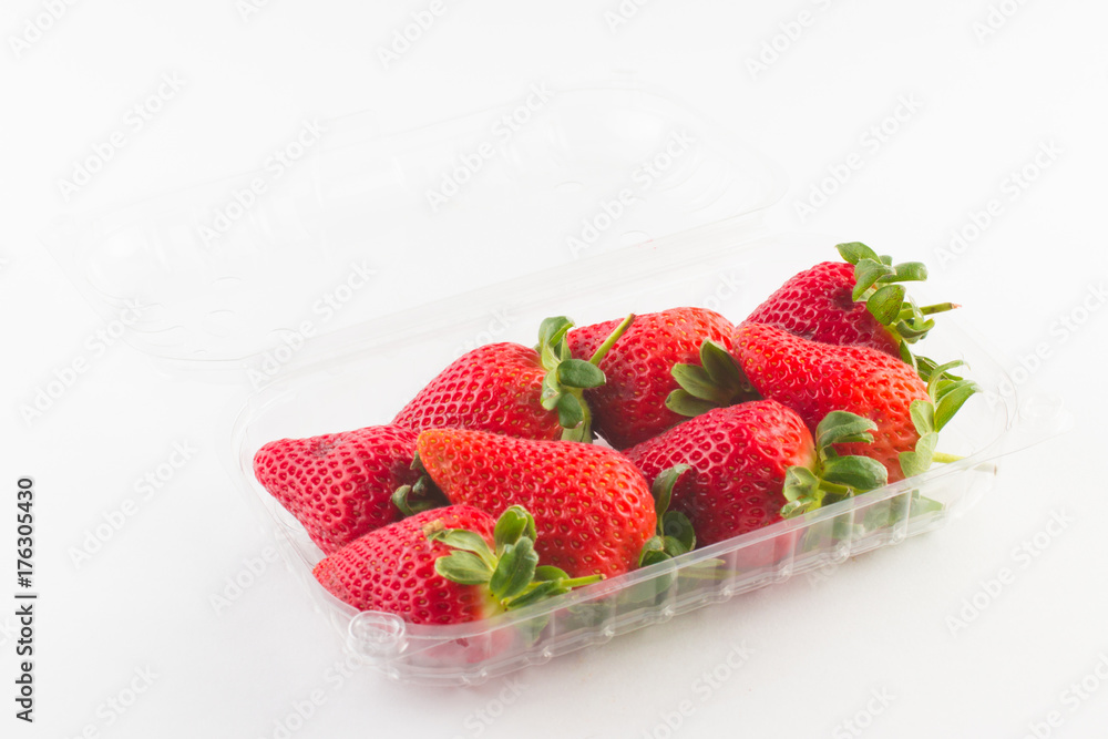 strawberry in plastic box of packaging for sale