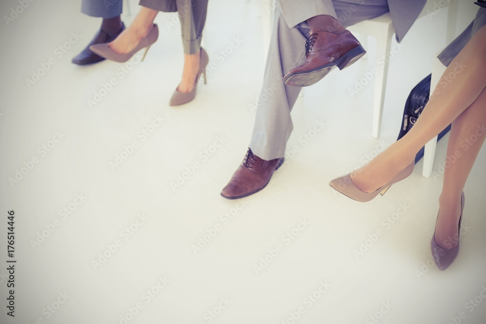 Business people sitting and waiting