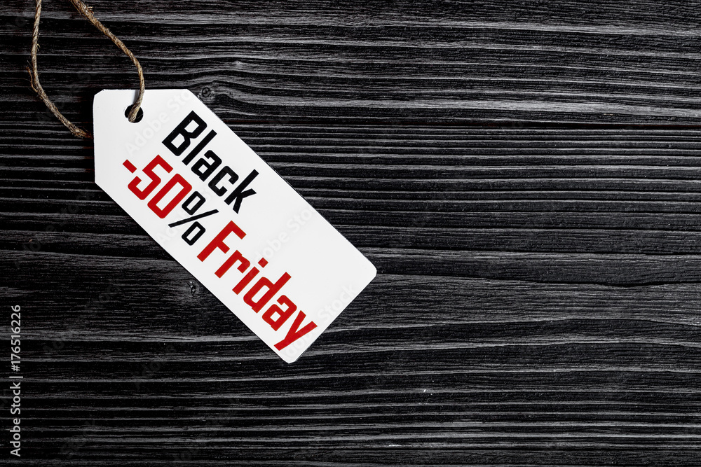 concept black friday on dark wooden background top view