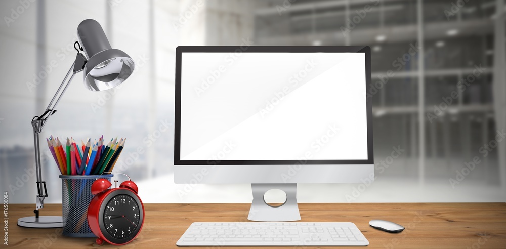 Composite image of image of a desk with computer