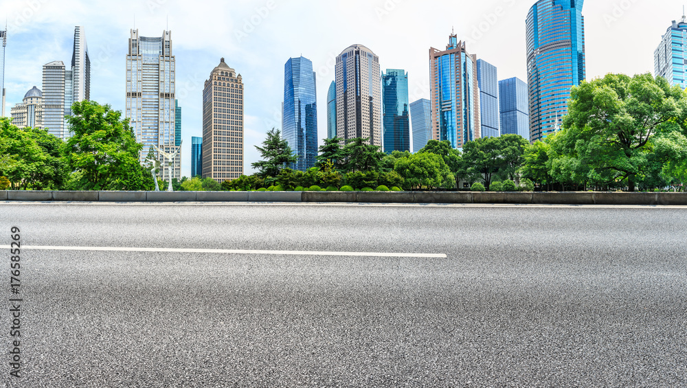 Shanghai Lujiazui financial district commercial building and asphalt road panorama,China