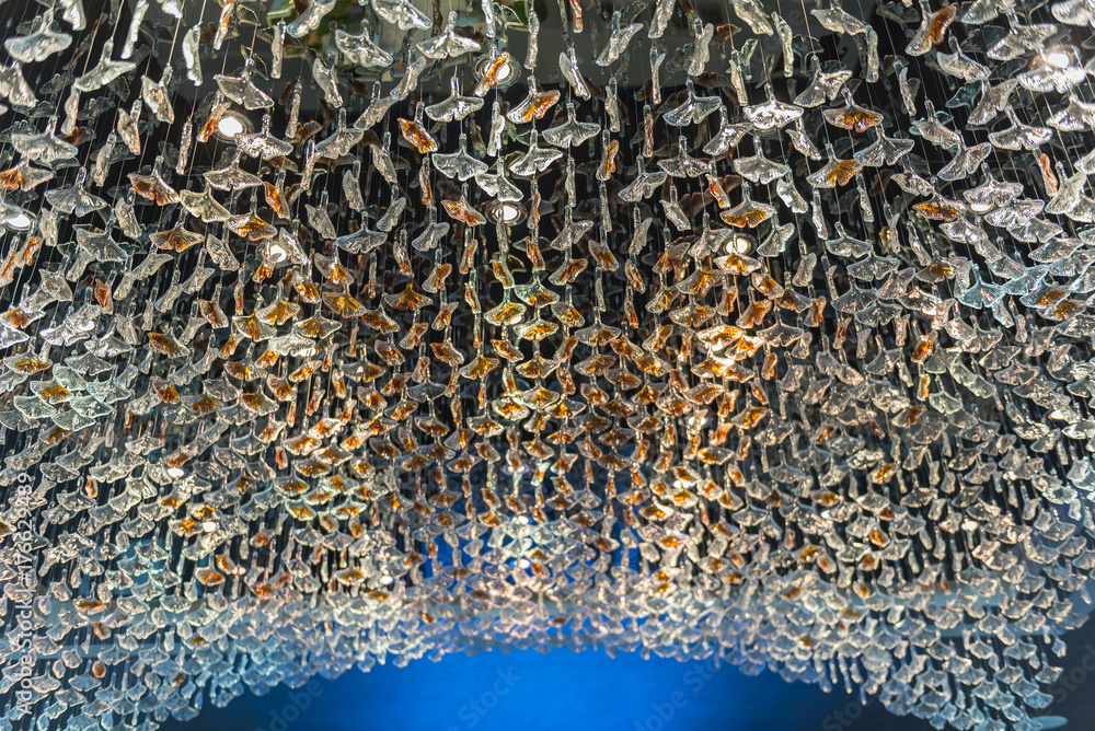 hanging crystal mobile chandelier with birds pattern on ceiling