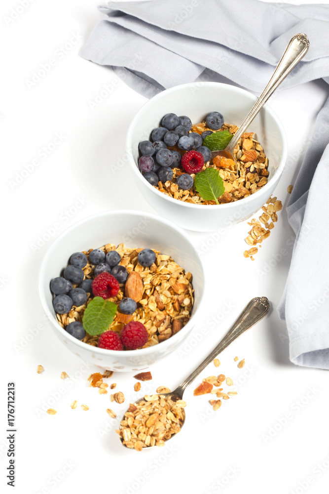 Healthy breakfast -  Homemade granola, honey, milk and berries