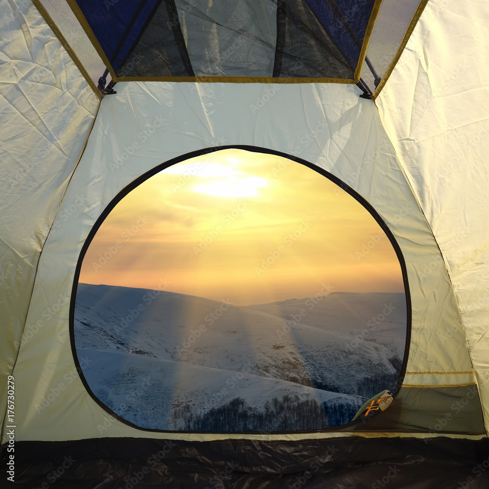 View from inside a tent on mountains landscape