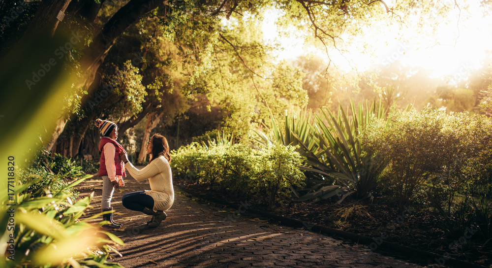 Mother and daughter in the park