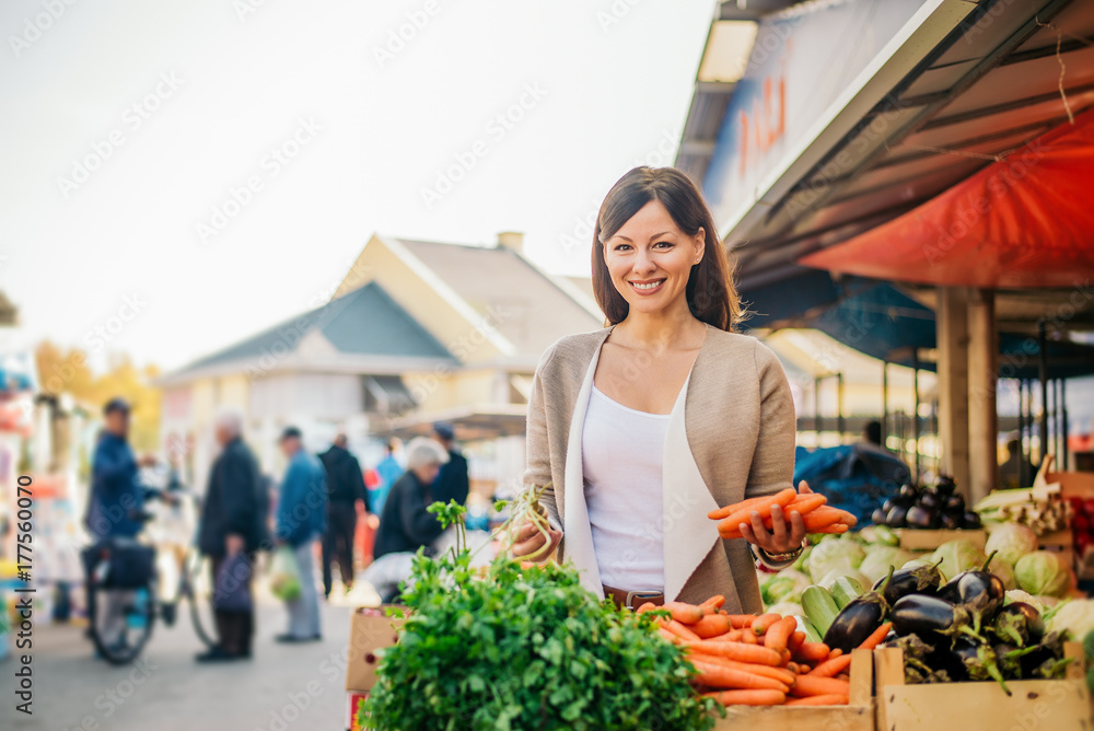 Portrait of a beautiful woman at the market.