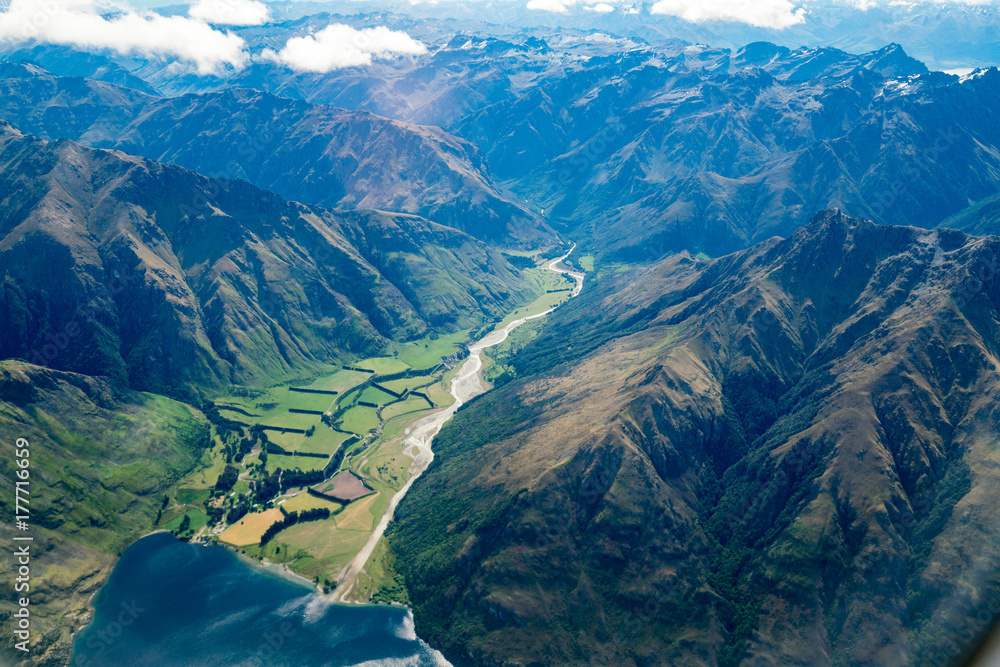 Aerial view of mountain ranges and lake landscape