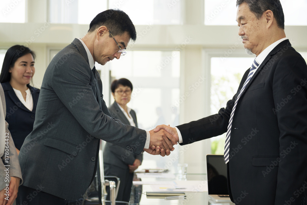 Corporate business people handshaking