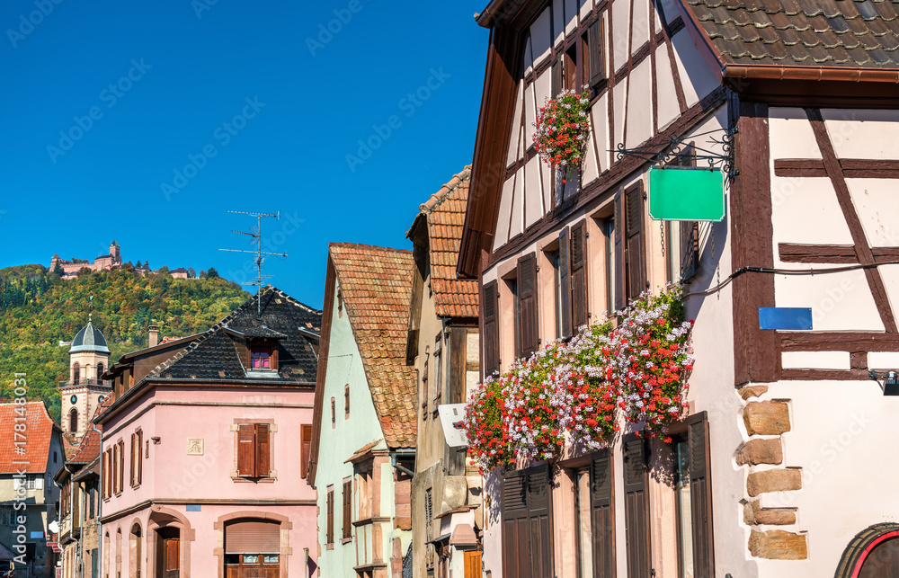 Saint-Hippolyte village with Haut-Koenigsbourg castle on top of a mountain - Alsace, France