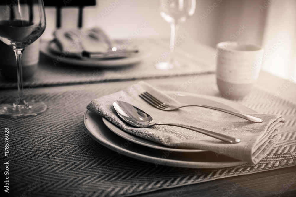 dining set with dish and spoon on white clean napkin