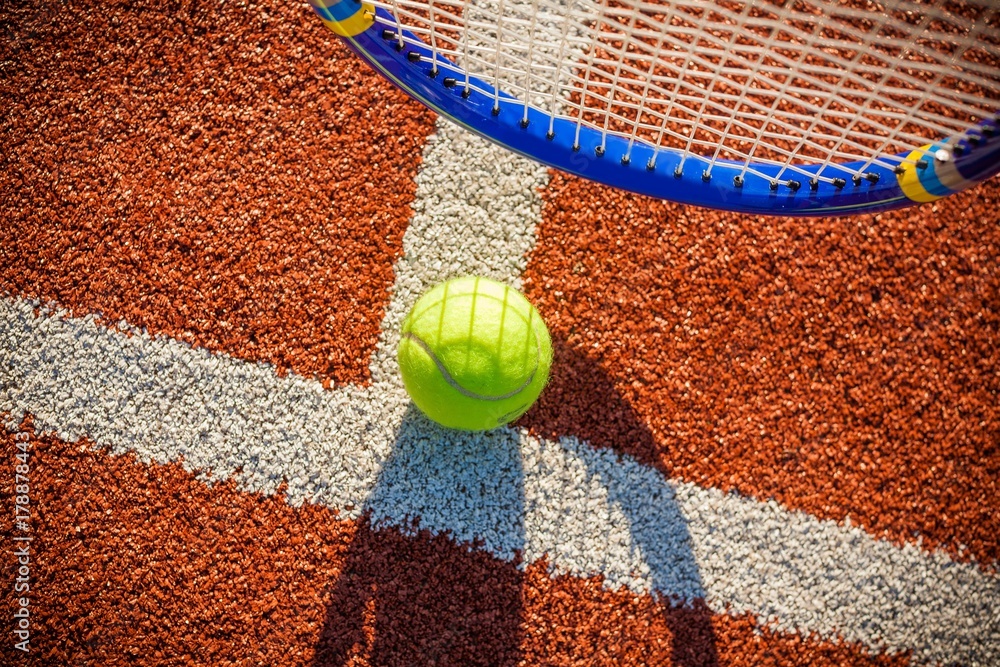 Tennis Racket and Ball on a Tennis Court