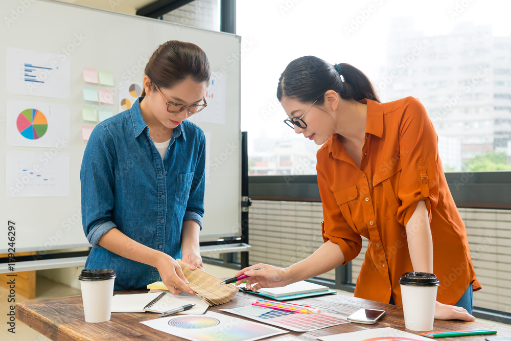 attractive female assistant holding  palette tool