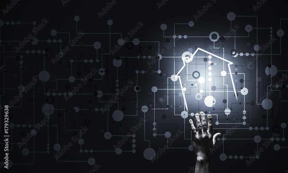 Conceptual image with hand pointing at house or main page icon o