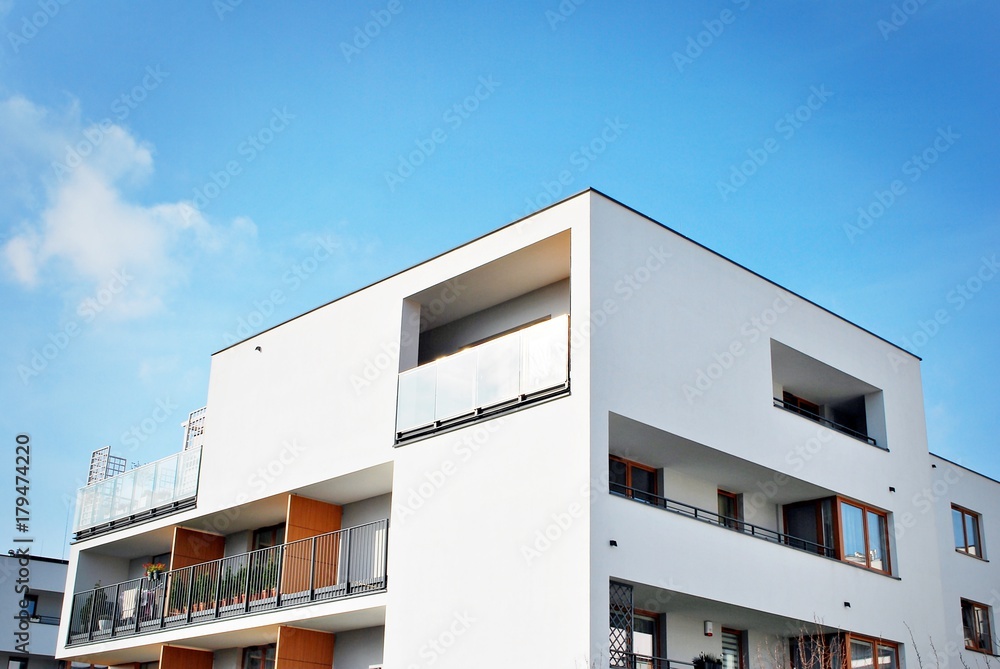 Modern apartment buildings on a sunny day with a blue sky