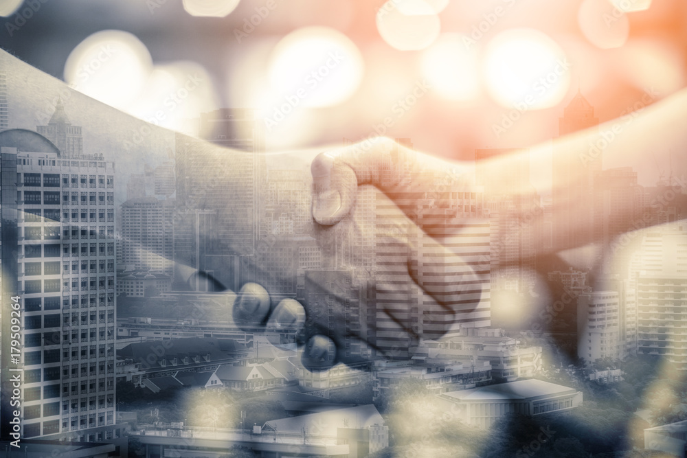  businessman friend giving handshake during Meeting for success and agreement to express teamwork/to