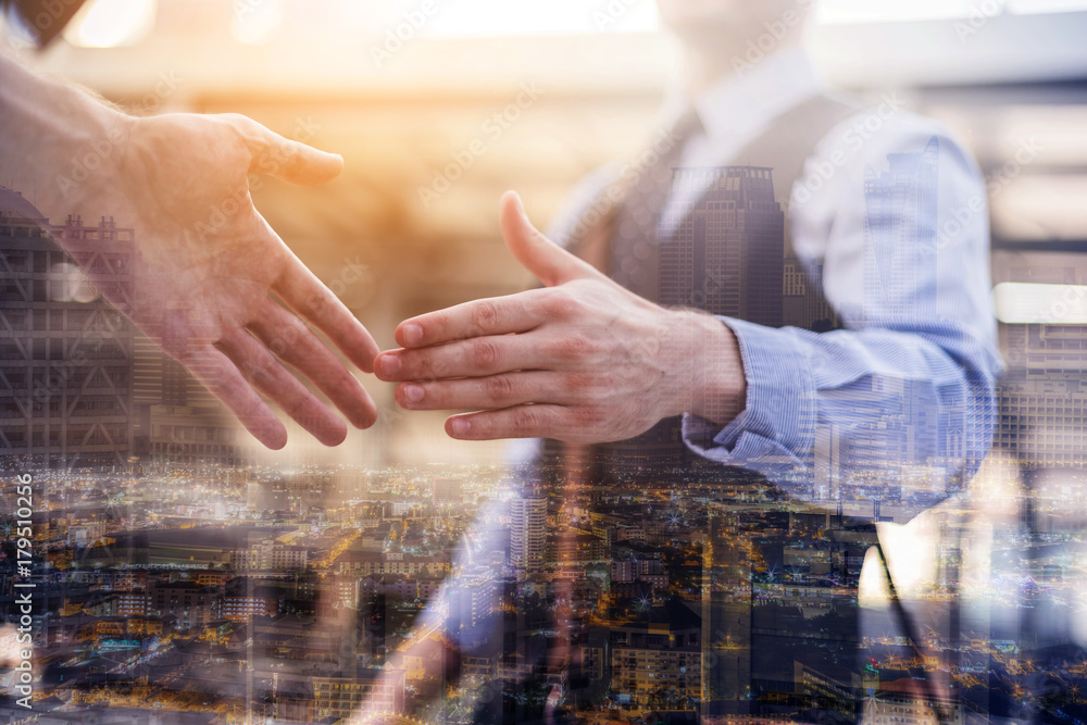 confident business man shaking hands during a meeting in the office, success, dealing, greeting and 