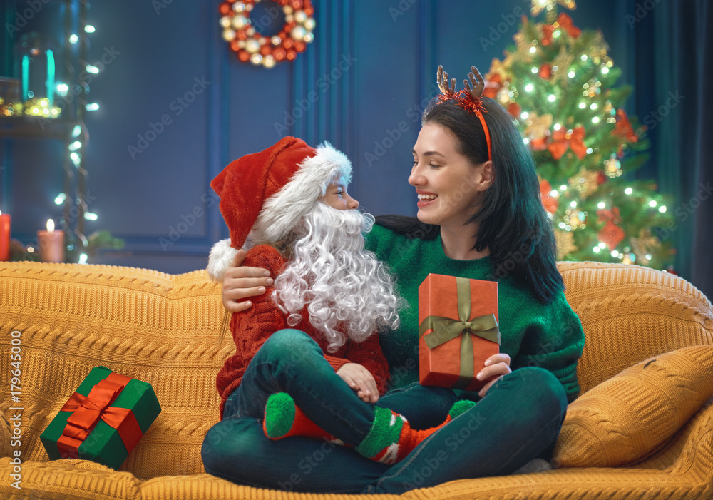 Mother and daughter exchanging gifts