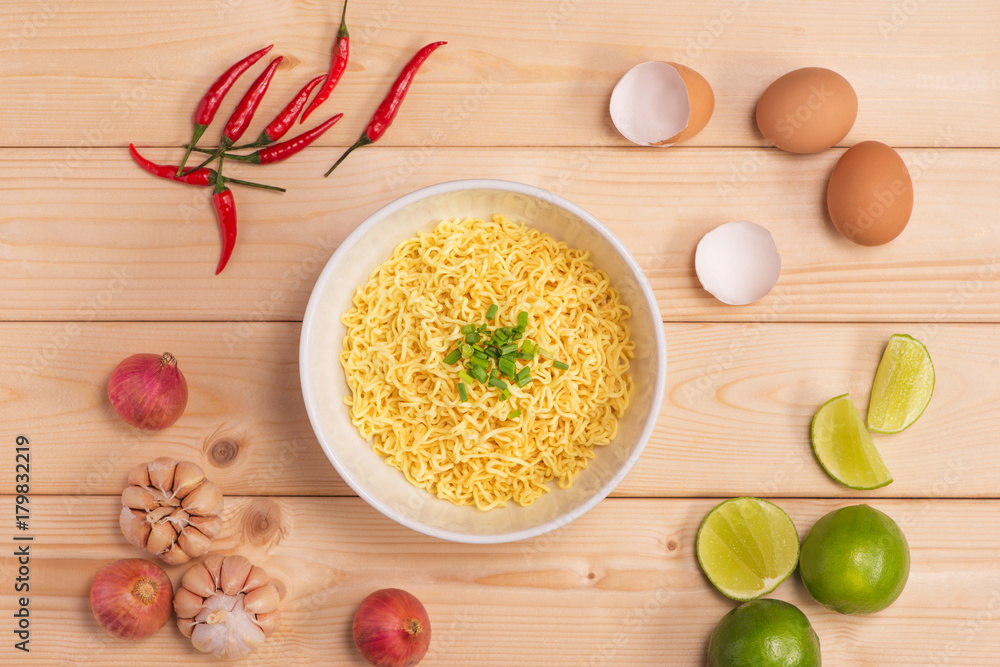 instant noodles in bowl with vegetable.