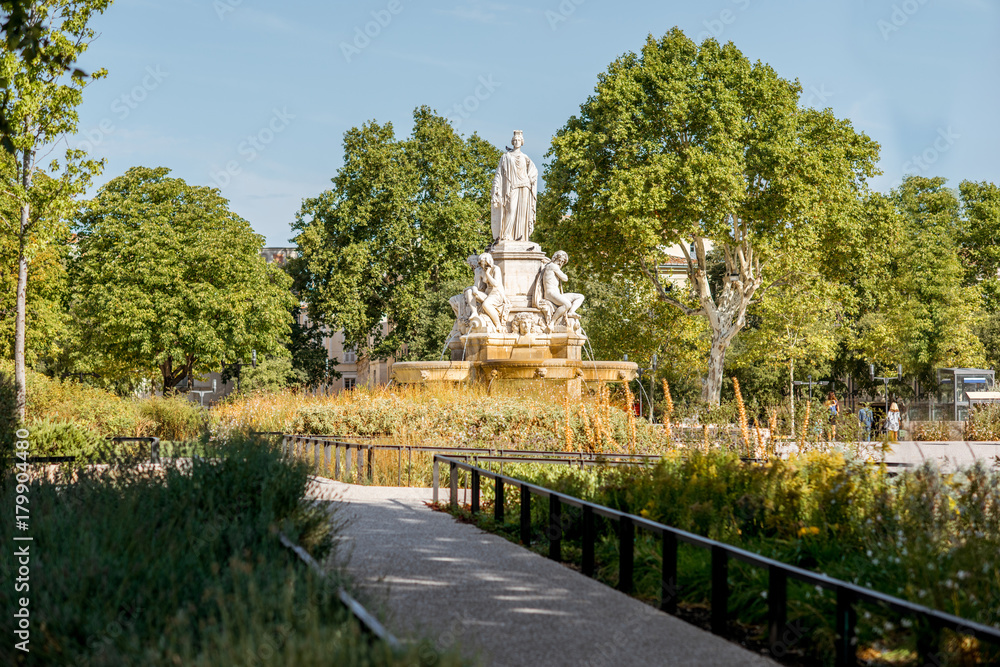 View on the Charles Gaulle fountain in Nimes city during the sunny morning in the Occitanie region o