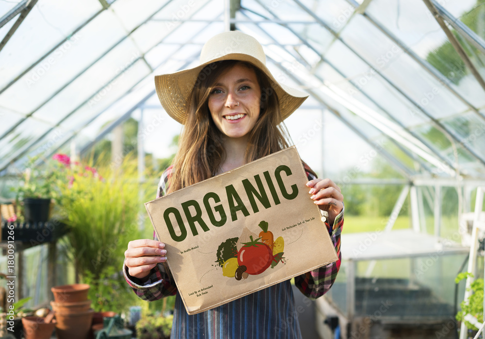 Young woman with organic vegetable