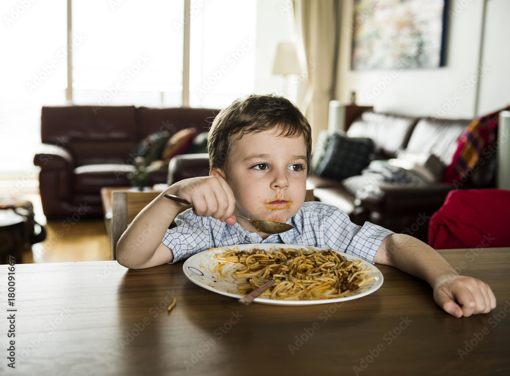 Boy eating sp