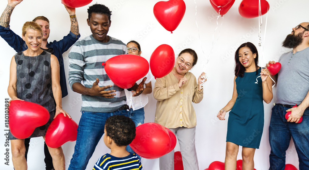 Group of Diverse People Holding Heart Balloons Cheerful