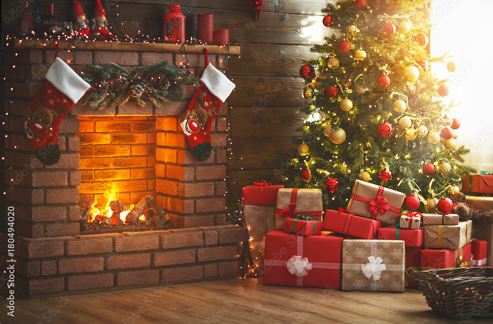 interior christmas. magic glowing tree, fireplace, gifts