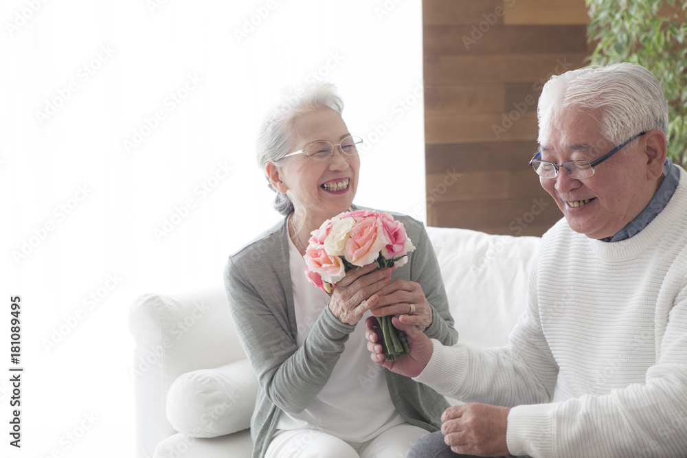 An old lady gifted a bouquet for her husband