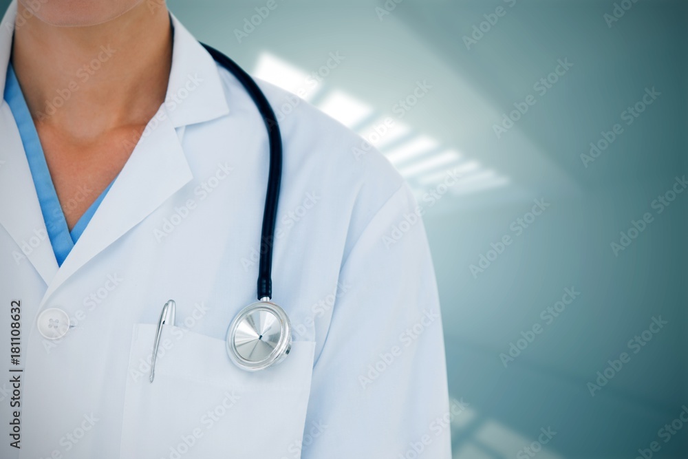 Composite image of doctor wearing lab coat with stethoscope