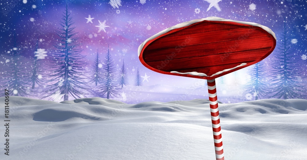 Wooden signpost in Christmas Winter landscape