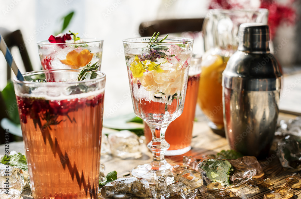 Summer cocktails with decorative flower petals