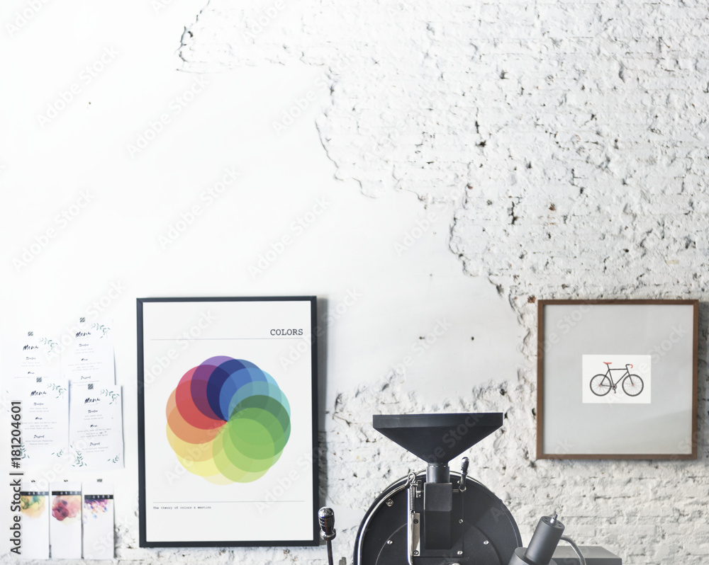 Coffee roaster with photo frames on the wall