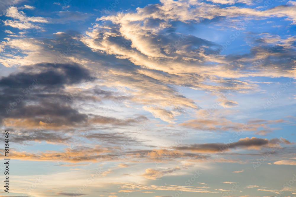 Dramatic sunset and sunrise sky with beautiful and colorful nice soft cloud background concept.